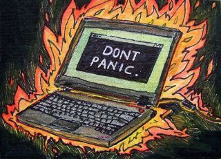 Flaming computer - "don't panic" (4549185468).jpg